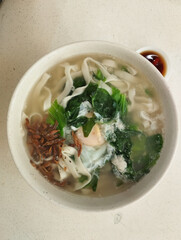Chinese cuisine ban mian noodle soup with egg