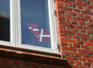 Two Small Danish Flags Waving