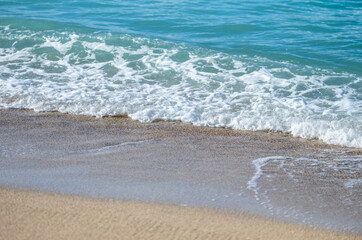 Ocean Wave Surging onto a Sand Beach in Honolulu Hawaii.