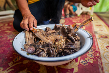 cooked sheep insides traditional mongolian meal served in yurt
