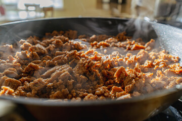 Close up of ground meat in pan 