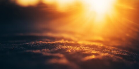 Fototapeta premium A beautiful sunset casting warm tones across a serene landscape, highlighting the subtle textures of the terrain.