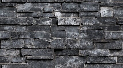 Naklejka premium Charcoal black brick wall featuring an abstract grunge design with faded black and grey tones Textured banner with space for text complemented by a distressed grey wooden brick background