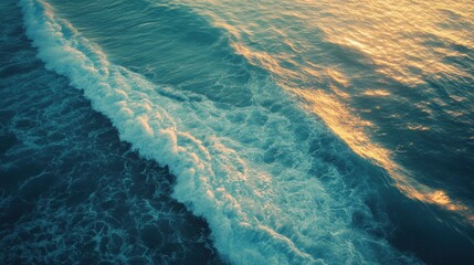 A serene view of ocean waves gently rolling in, reflecting warm sunlight.