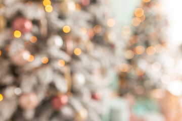 Beautiful holiday decorated room with Christmas tree and bright lights , out of focus shot for...