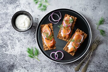 Marinated salmon cream cheese rye bread sandwiches