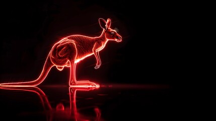Fototapeta premium Neon Red Kangaroo Hopping Dynamically Against Black Background