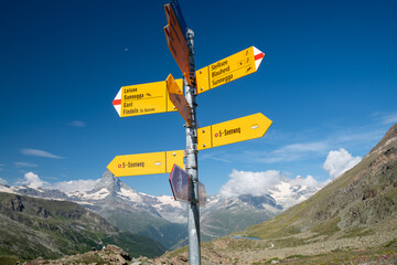 Hiking trail directional signs post, along the Five Lakes Trail - Zermatt, Switzerland
