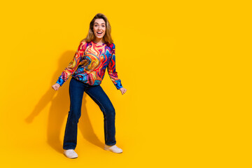 Photo portrait of young funny blonde hair attractive girl chill out dancer celebrating clothes sale isolated on yellow color background