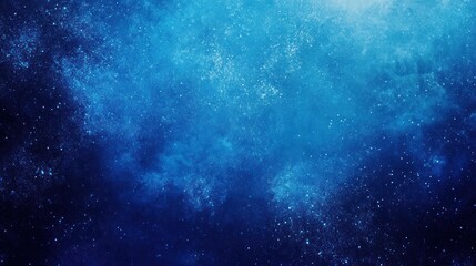 Fototapeta premium A captivating deep blue cosmic background filled with shimmering stars and ethereal nebula-like textures, evoking a sense of wonder.