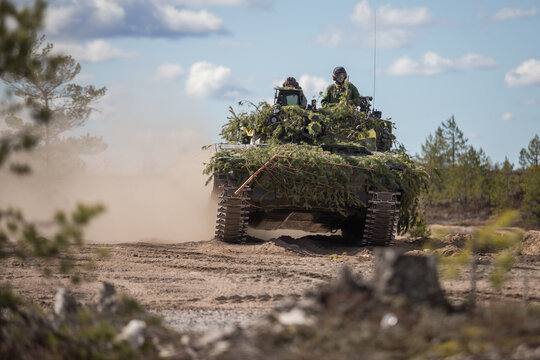 Danish infantry fighting vehicle ( CV90) during exercise Arrow in Finland, Combat Vehicle 90 is a family of Swedish tracked combat vehicles designed by H&auml;gglunds and Bofors