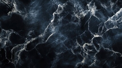 Elegant black marble texture with swirling gray veins, creating a luxurious and dramatic background.