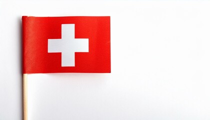 Obraz premium 小さな紙のスイス連邦の国旗（small paper Switzerland flag） 