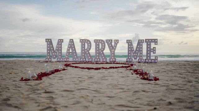 Marry Me decoration on beach  Will You Marry Me text font with neon light.text Marry Me. Will You Marry Me neon sign.