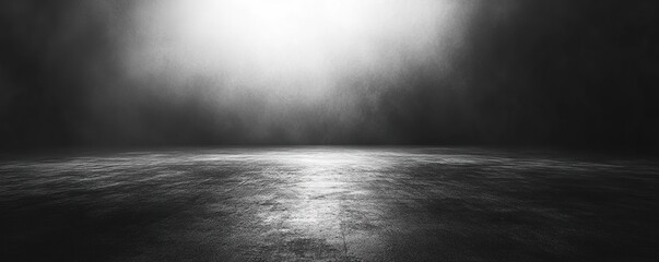 A dramatic black and white scene showcasing a lit foggy space with a reflective surface, perfect for artistic backgrounds.