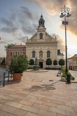 Beautiful city and street shot of an old town during the day. Summer weather in the city center at...