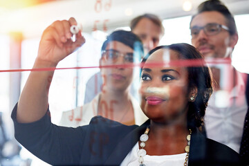 Business people, workshop and writing on glass wall for collaboration, brainstorming and...