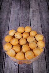 Traditional Indonesian nastar cookies filled with sweet pineapple jam on a jar. Food concept