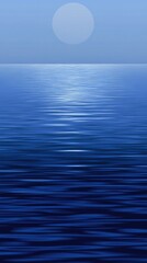 Obraz premium Big white moon is shining over a calm ocean at night, with its reflection on the water