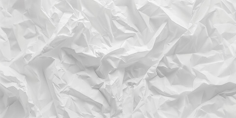 Crumpled white paper texture background, top view, close-up.