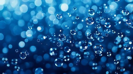 An abstract background with a blur of blue lights and floating bubbles, symbolizing purity, serenity, and the beauty of nature.