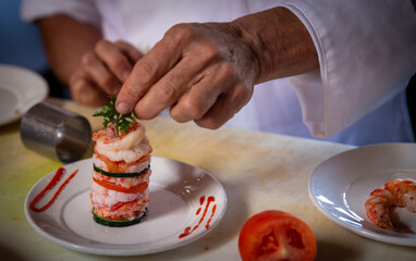 Chef making a seafood tower