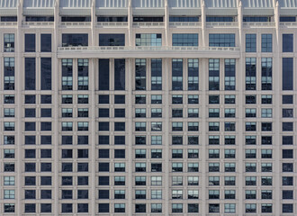 Fototapeta premium Geometric windows on front of building