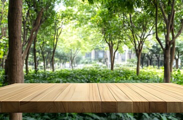 Obraz premium Wooden Tabletop with Blurred Green Forest Background for Product Display and Mockups