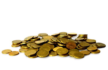coins piled up on table saving money no people on white background stock images stock photo