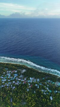 Maldives Coastal line, waves breaking on an island, Fuvahmulah,Equator