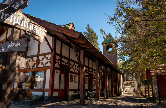 CORDOBA, ARGENTINA, MAY 5, 2022: Typical street corner in Villa General Belgrano with countryside German style buildings