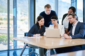 Group, serious and laptop for review, office and discussion with men, brainstorming or thinking....