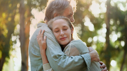 Hugging lovingly in the park