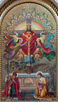 ASTI, ITALY - SEPTEMBER 10, 2024:  The fresco of Crucificted Jesus the King in the church Santuario di Nostra Signora Porta Paradisi by Anacleto Laretto (1927).
