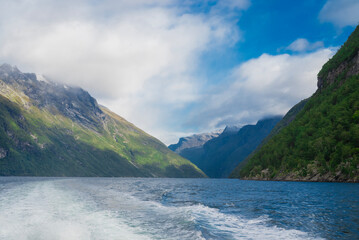 view of the beautiful bay of geiranger fjord in norway with mountains rocks