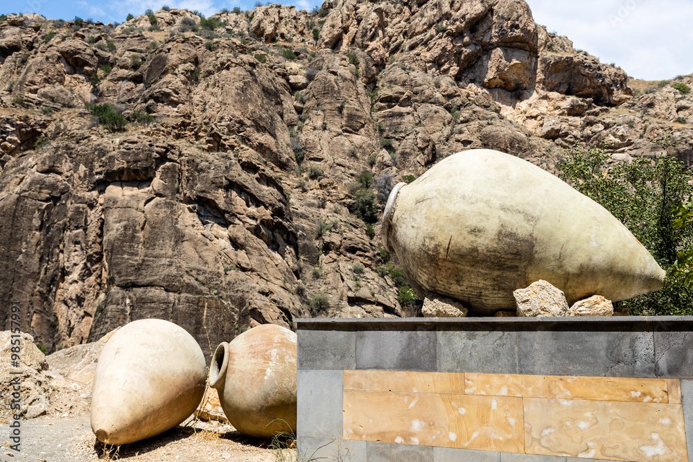 Canvas Prints old kvevri wine vessels and rocks in background