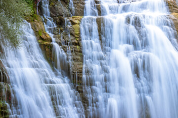 Obraz premium Close-up of Tortum Waterfall's cascading flow, symbolizing the relentless power and fluidity of nature