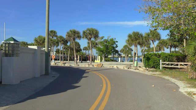 Driving on Casey Key scenic road in Florida.