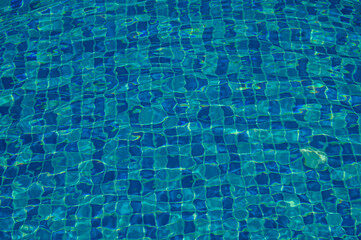 photrealistic of swimming pool water surface. water texture backgrounds.