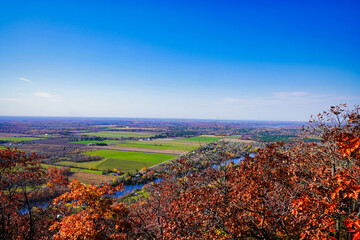 Magnificent sweeping views from the highest point on the King mountain and Eardley escarpment with a view of the spectacular autumn fall colours in red,orange and yellow at Gatineau Park,Quebec,Canada