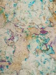 colorful concrete wall paint peeling off