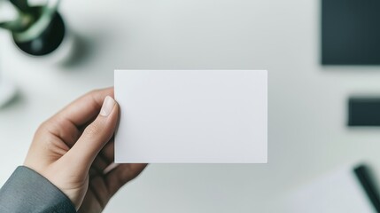 Obraz premium Blank ID card with QR code placeholder, positioned on a modern business desk, technology and identity concept