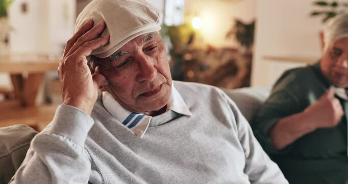 House, fight and senior couple on couch, argument and conversation with marriage, crisis or frustrated. Shouting, elderly man or old woman with emotions, relationship or stress with conflict or anger