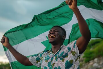 Nigerian flag bearer proudly holds aloft national emblem amidst lush green plants, beaming joy, pride in high-resolution medium shot. His smile radiates warmth as he gazes directly into camera lens.