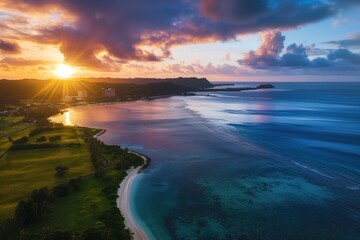 Aerial view of beach in Guam at sunrise. Turquoise ocean, sandy shoreline, palm trees, cloud, sunbeam. Tropical paradise with calm sea, sunlit horizon. Peaceful scenery with clear sky, coastal