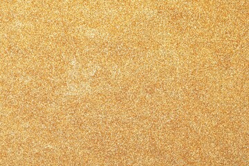 Beautiful shiny golden glitter as background, top view