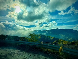 landscape with clouds and sun
