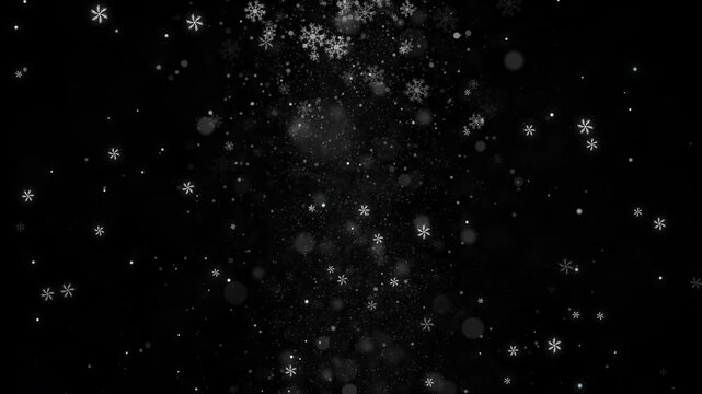 Glittering snowflakes drift down gently in this elegant, glowing particle loop, ideal for winter-themed videos.