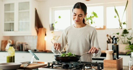 Woman, smartphone and cooking in house for breakfast, recipe and online video with tips or guide. Female person, smell and meal prep in kitchen for brunch, instructions or learning with food podcast