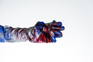 A blue witch hand with red nails, wrapped in a blood-stained bandage against a white background. This eerie, monstrous image evokes demonic, zombie, and ghostly vibes, perfect for Halloween horror.
